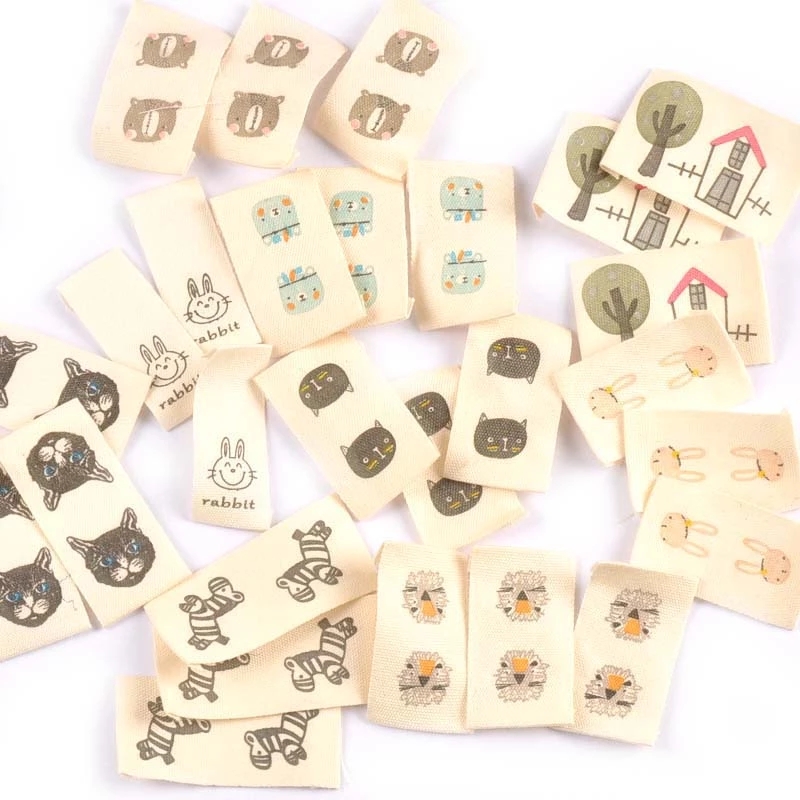 米色纯棉卡通动物服装领标手工折边布标布贴服饰标签50个/包
