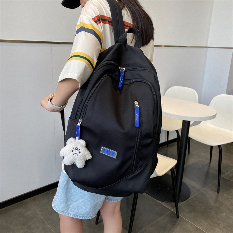 2022年新款笔记本电脑双肩包韩版简约初中高中大学生纯色休闲背包