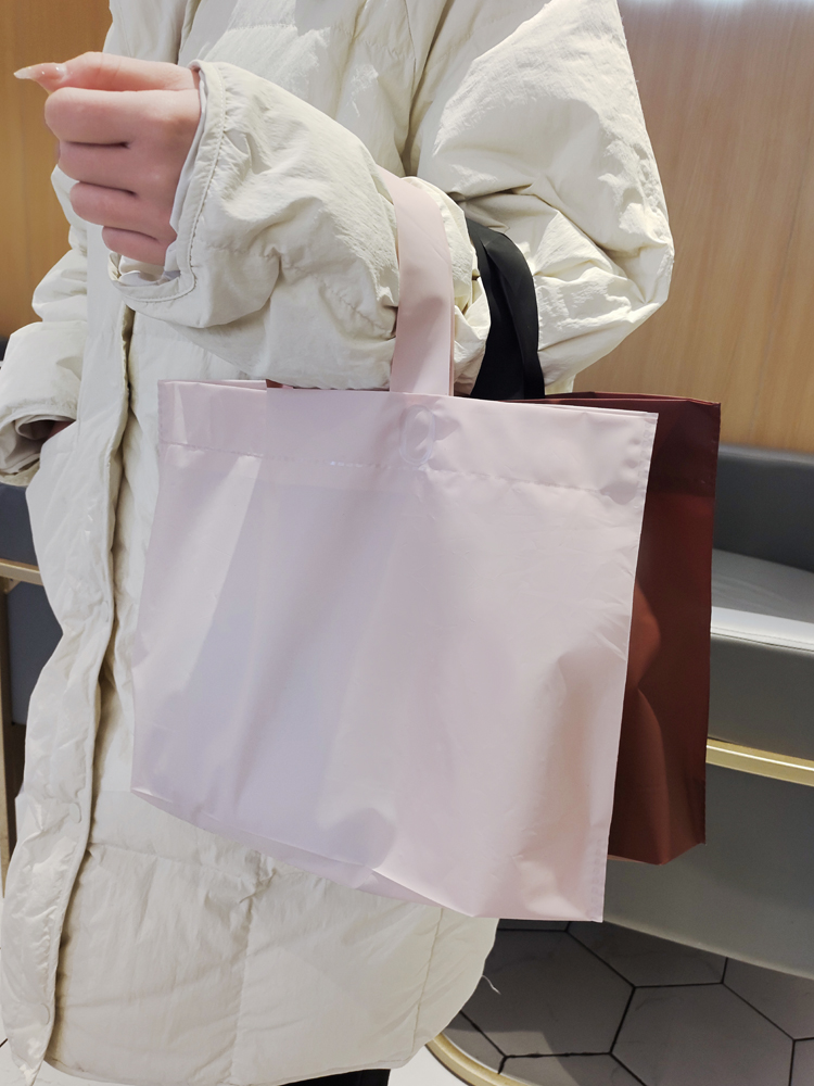 加厚磨砂服装店袋子童装店用塑料袋手提袋女装定制手提购物袋批发